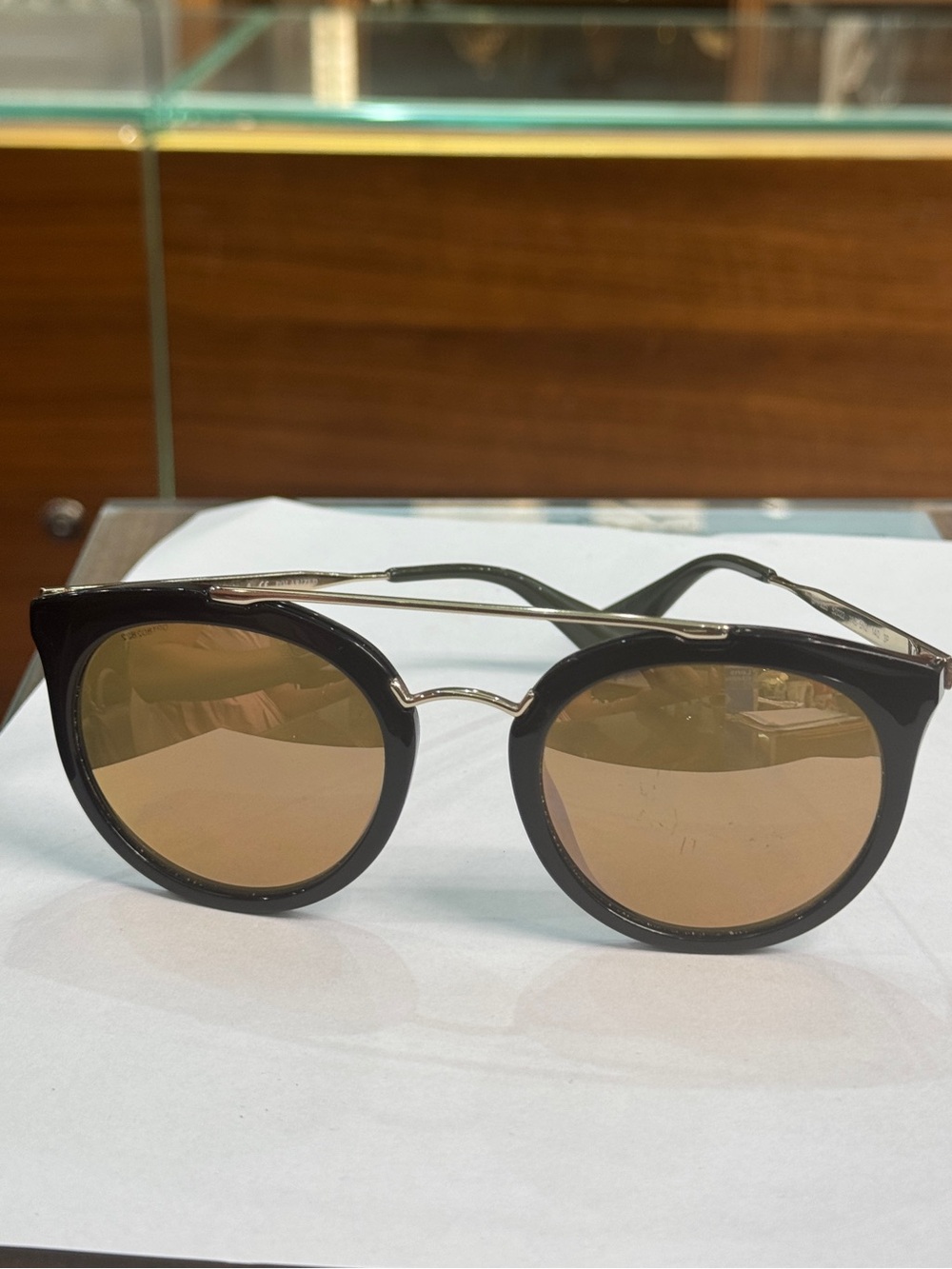 AUTHENTIC PRADA Round Black Frame Sunglasses with Brown Lenses